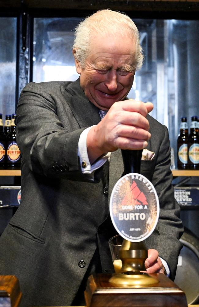 King Charles III pours a pint during a visit to the Tower Brewery. Picture: Getty Images