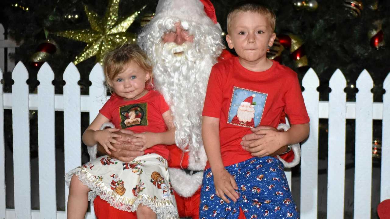 FESTIVE CHEER: Faith, Jimmy and Connor Edmonds enjoyed the visit from Santa. Picture: Marissa Newman