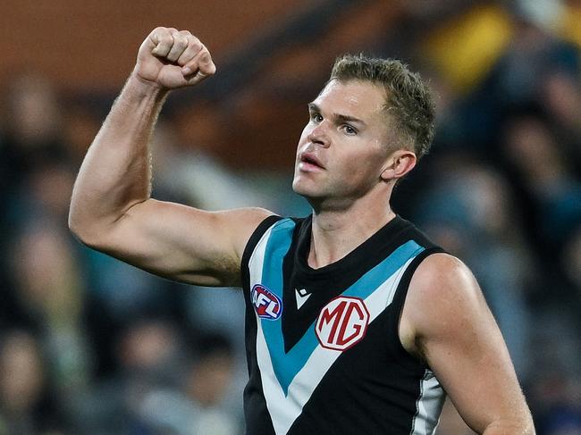 ADELAIDE, AUSTRALIA - AUGUST 03: Dan Houston of the Power  celebrates a goal  during the round 21 AFL match between Port Adelaide Power and Sydney Swans at Adelaide Oval, on August 03, 2024, in Adelaide, Australia. (Photo by Mark Brake/Getty Images)