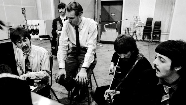 The Beatles in the studio with George Martin, recording Sgt Pepper's in 1967.