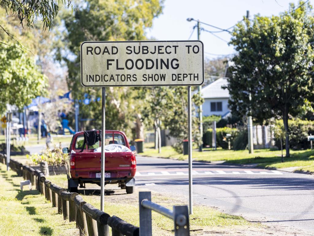 Road Subject to Flooding sign in Rocklea, on Tramore Street. Picture : Matthew Poon.