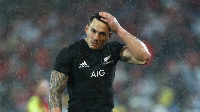 Sonny Bill Williams of the All Blacks walks off the pitch after being shown a red card.