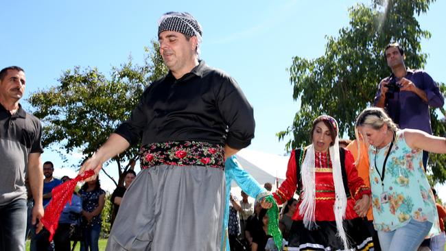 Traditional Iranian dancing was part of celebrations at Auburn Centre for Community with SSI. Picture: Peter Kelly.