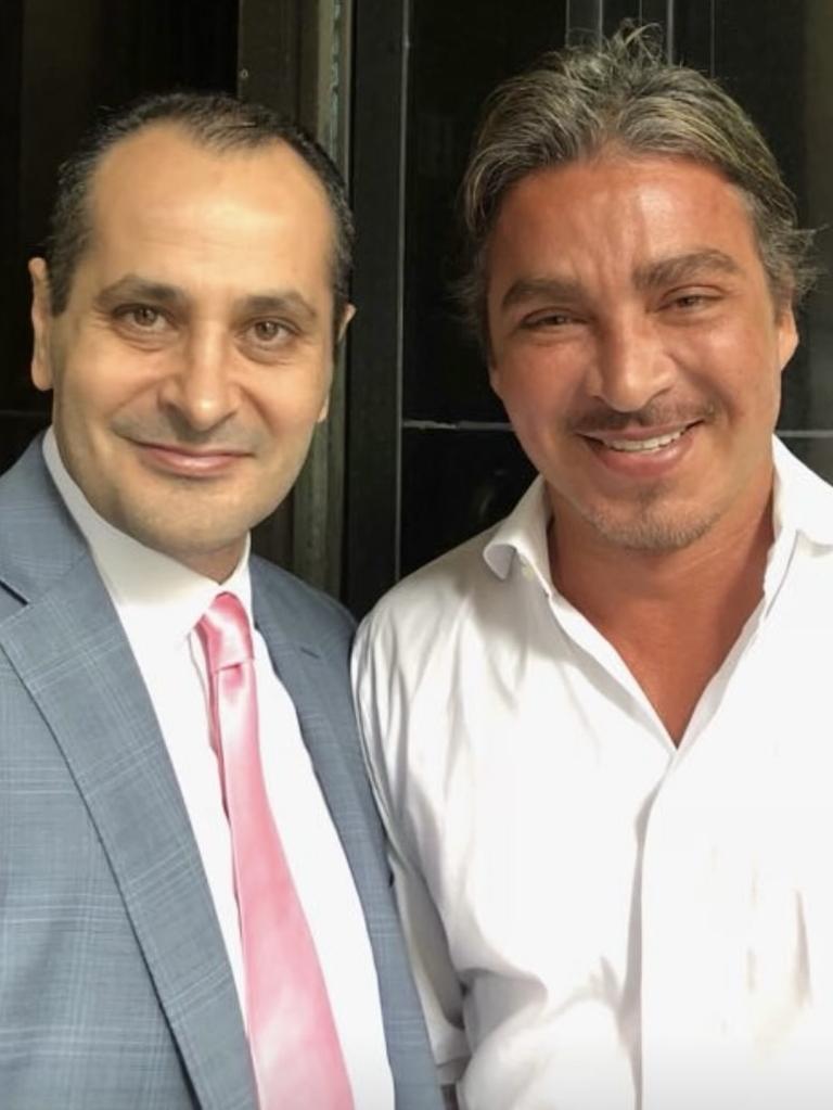 Businessman Michael Ibrahim poses with Kings Cross identity John Ibrahim in 2017. John says it was a random meeting at a function and he does not know Michael. Picture: Supplied