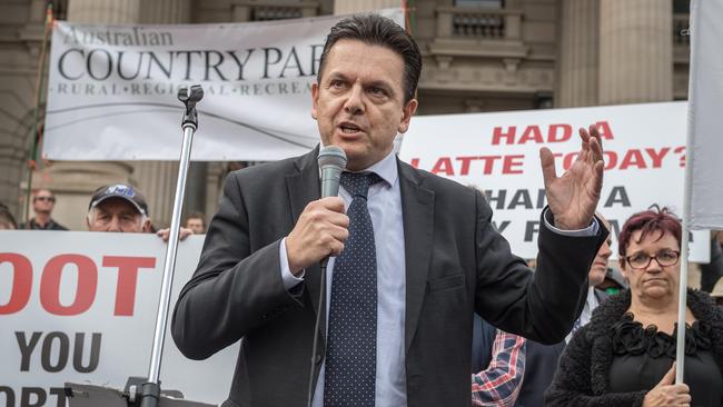 Senator Nick Xenophon addressing dairy farmers’ protest in Melbourne. Picture: Jake Nowakowskii