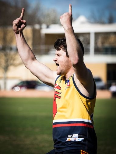 Trinity Old Scholars’ Ryan Clarke celebrates in the match against Marion. Picture: Carly Grant Photography