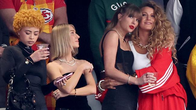 Singer Taylor Swift and Actress Blake Lively hug prior to the Super Bowl. Picture: Steph Chambers