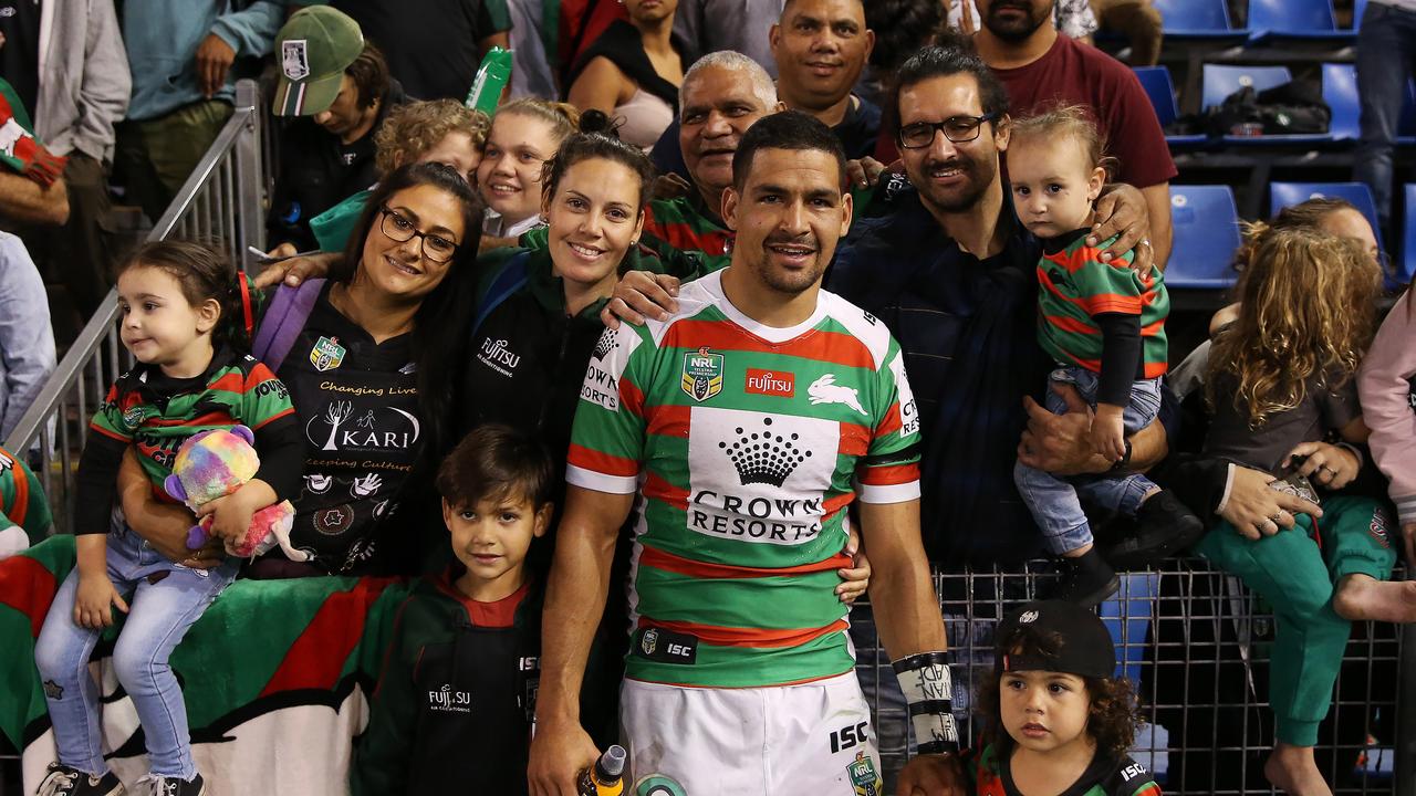 Walker joins his extended family on the sidelines for a photograph opportunity.