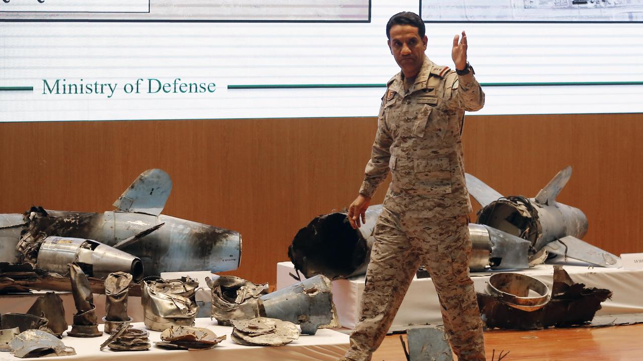 Saudi military spokesman Colonel Turki al-Malki displays what he describes as an Iranian cruise missile and drones used in the attack on Saudi Arabia's oil industry. Picture: Amr Nabil/AP