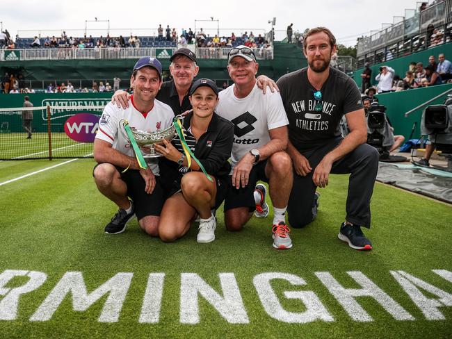 Ash Barty celebrates victory in Birmingham with her team (from left) Garry Kissick (Barty's boyfriend), Jim Joyce (Barty’s former coach), Barty, Craig Tyzzer (Ash's current coach) and Mark 'Beefy' Taylor (physical coach). Picture: Steve Feeney/Getty