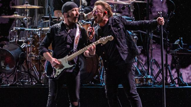 Bono sings to a packed Marvel Stadium. Picture: Jason Edwards