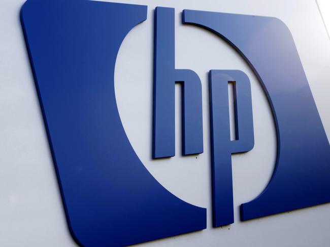 FILE - This Feb. 21, 2012 file photo shows a Hewlett Packard logo in Frisco, Texas. Hewlett-Packard said Wednesday, May 23, 2012 that it's laying off 27,000 workers, 8 percent of its work force, as it restructures the business. The Palo Alto, Calif., company said it'll save $3 billion to $3.5 billion annually from cost cuts, including the layoffs. Hewlett-Packard Co. expects to complete the job cuts by the end of fiscal 2014. (AP Photo/LM Otero, File)