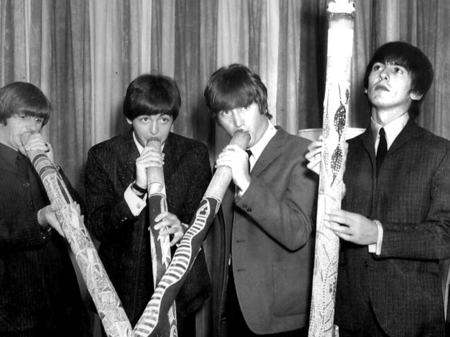 File Pix Beatles Australian tour 1964 (This pic may be Sydney) - (l-R) ringo Starr, Paul McCartney, John Lennon and George Harrison playing didgeridoos - music bands groups didgeridoo Picture: File Photo