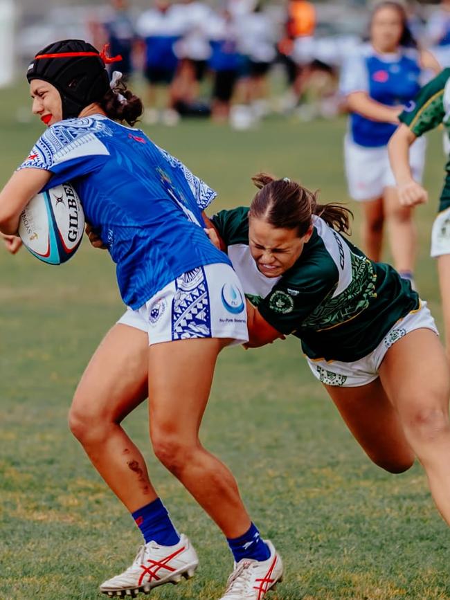 Charlie Hargraves tackling a player at the 7s state champs