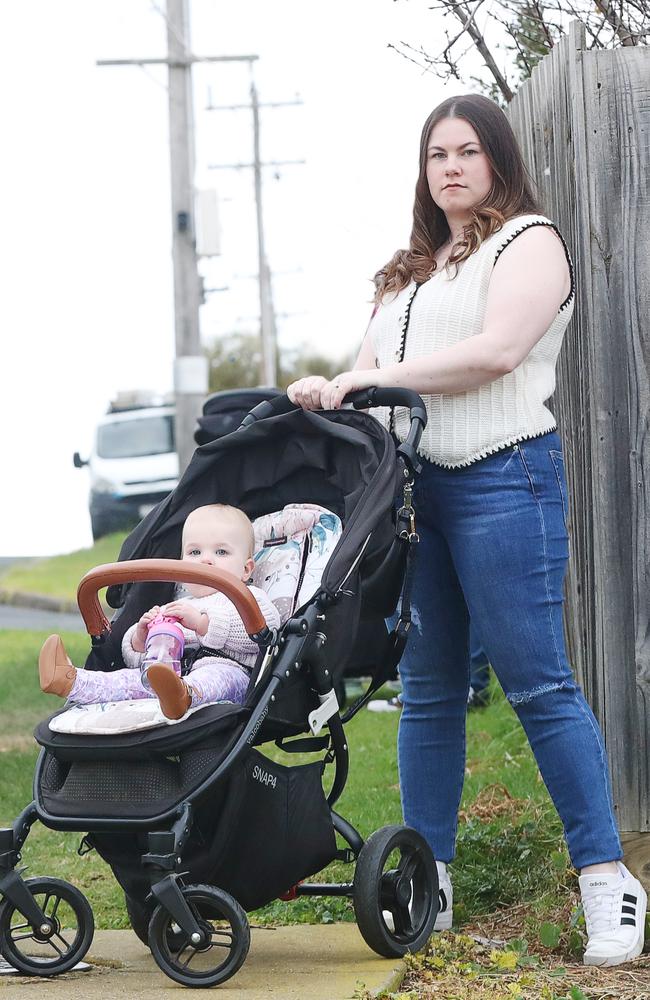 Phoebe Thompson and baby Aurora where the footpath on Coolabah Drive suddenly finishes. Picture: Alan Barber.