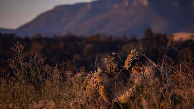 Australian army soldiers from the 3rd Battalion, Royal Australian Regiment, conduct battle preparation prior to a section attack during the 2022 Duke of Gloucester Cup in Singleton. *** Local Caption *** Australian Army infantry soldiers from across Australia tested their core skills for the prestigious Duke of Gloucester Cup at the School of Infantry, near Singleton in NSW, July 31 - August 5 2022. The Duke of Gloucester Cup is the Armyâ€™s premier military skills competition, pitting the best Royal Australian Corps of Infantry rifle sections from each unit against one another through a series of challenging activities that test their core infantry skills, including marksmanship, tactics, teamwork and fitness. Along with the Duke of Gloucester Cup, five other trophies are awarded: Sir Arthur MacDonald Trophy for best foundation war-fighting skills; Gurkha Trophy for best live-fire shooting; Royal Ulster Rifles Trophy for best falling plate shooting; OSCMAR Trophy for best battle endurance; and the DSM Roche CSC Memorial Cup for best individual soldier. The Duke of Gloucester Cup was created by Prince Henry, Duke of Gloucester, in 1946, while serving as the Governor-General of Australia.