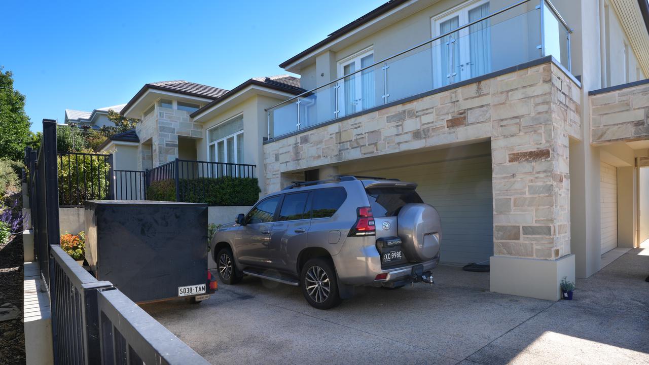 The scene and house at 28 Highfield Drive Craigburn Farm, where a police shooting in a mental health case, took place. Picture: Dean Martin