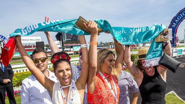 Gabby Maloney, Kate O'Neill and Anna Power at the Magic Millions Race. Picture: Jerad Williams