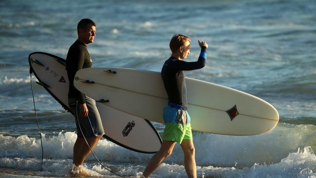 Liberal candidate James Griffin and Mike Baird take to the surf as ...