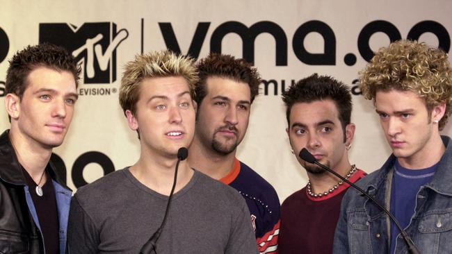 The curl years ...  `N Sync were created to replace and conquer Backstreet.