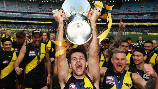 Trent Cotchin and his teammates celebrate the Tigers’ win on the fabled MCG.