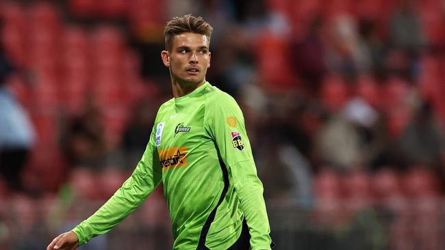 SYDNEY, AUSTRALIA - DECEMBER 16: Chris Green of the Thunder  looks on during the Men's Big Bash League match between the Sydney Thunder and the Adelaide Strikers at Sydney Showground Stadium, on December 16, 2022, in Sydney, Australia. (Photo by Cameron Spencer/Getty Images)