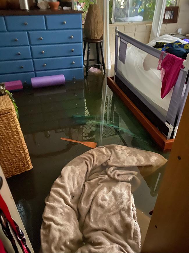 Ms Fenner and her daughter had been watching Frozen on TV as flood waters entered their home, rising rapidly in the space of two hours. Picture: Penny Fenner.