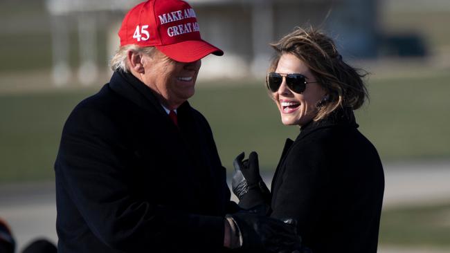 Hope Hicks with Donald Trump during a Make America Great Again rally in Dubuque, Iowa. Picture: AFP.