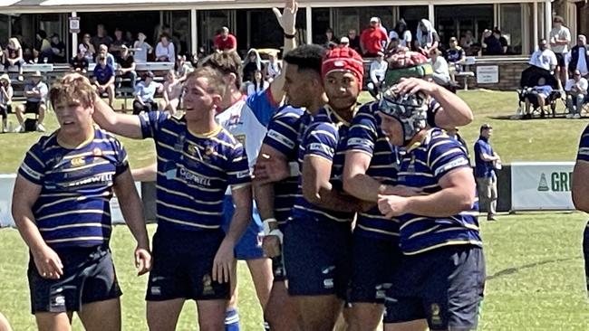 Easts Tigers celebrate a scrum win.