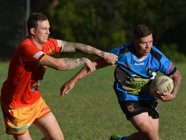 FIERCE RIVALS: Woolgoolga Seahorses hooker Michael Grant tries to get around Coffs Harbour Comets captain Brad Collinson when the two sides clashed in round six.