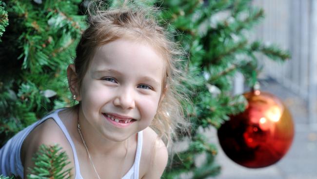 Natalie Ros, 6, was one of the three kids that turned on the lights on at the Esplanade Christmas tree last year.