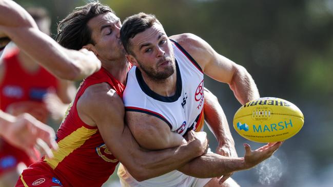 Brad Crouch, pictured in action against Gold Coast during pre-season, says Adelaide’s midfield has plenty to improve on. Picture: AFL Photos