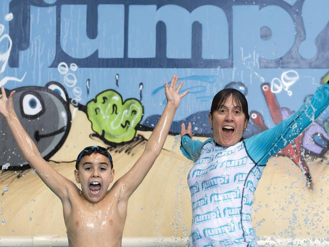 Elliott Gandarillas, with instructor Jeanette Bence, at the opening of centre in Geelong, Victoria, one of more 60 swim schools under the Jump! Swim Schools banner. Picture: Andy Brownbill