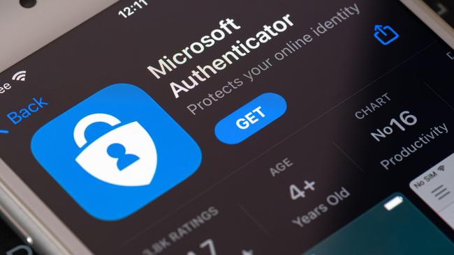 Guilherand-Granges, France - February 08, 2021. Smartphone with Microsoft Authenticator app logo. Two-factor authentication program that provides added security to your online accounts.