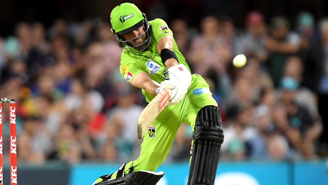 BRISBANE, AUSTRALIA – DECEMBER 17: Callum Ferguson of the Thunder hits the ball over the boundary for a six during the Big Bash League match between the Brisbane Heat and the Sydney Thunder at The Gabba on December 17, 2019 in Brisbane, Australia. (Photo by Bradley Kanaris/Getty Images)