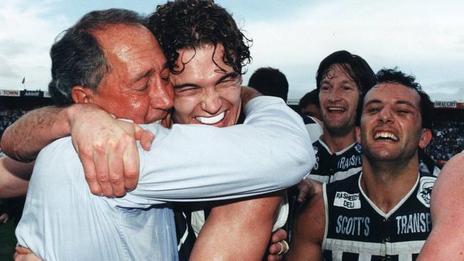 John Cahill, pictured after winning the 1995 SANFL grand final, and George Fiacchi (far right) are both upset at the loss of the Port Magpies for the 2020 season.