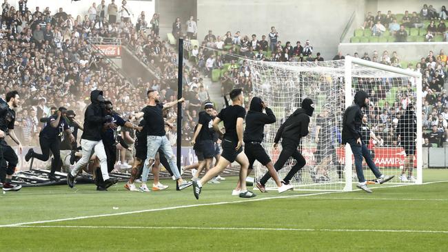 Disgusting scenes as fans storm the pitch in protest on Saturday night. Picture: Darrian Traynor/Getty Images