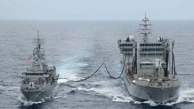 The Indian destroyer Ranvijay is refuelled by tanker INS Deepak on Wednesday during the Malabar naval exercise in the Arabian Sea. Picture: Indian Navy via AFP