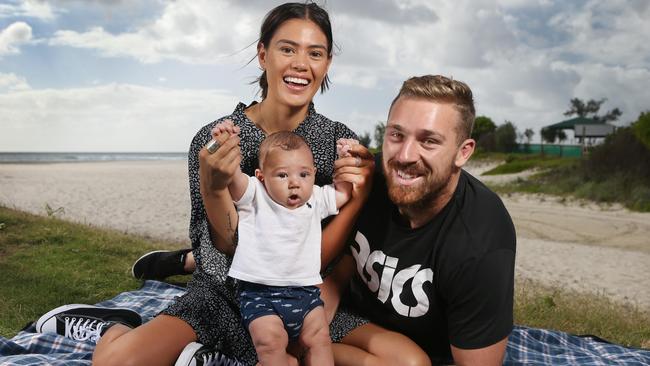 Cartwright with partner Shanelle and son Koa at Currumbin. (Glenn Hampson)