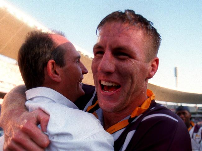 27 Sept 1998. Coach Wayne Bennett and Brad Thorn hugging after Canterbury  Bulldogs vs Bris Broncos NRL grand final at SFS. pic trent/parke. headshot smiling sport rugby league nsw