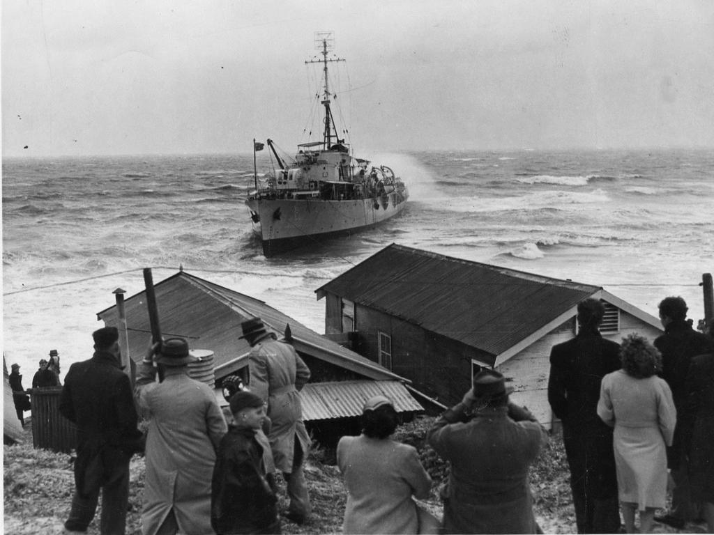 Adelaide experienced its fiercest storm on record on April 11, 1948, when winds reached 81 mph. Most spectacular event was the grounding of the naval frigate Barcoo after she had dragged her anchors off Glenelg. Pictured is the vessel aground about a mile north of Glenelg. Picture: The Advertiser