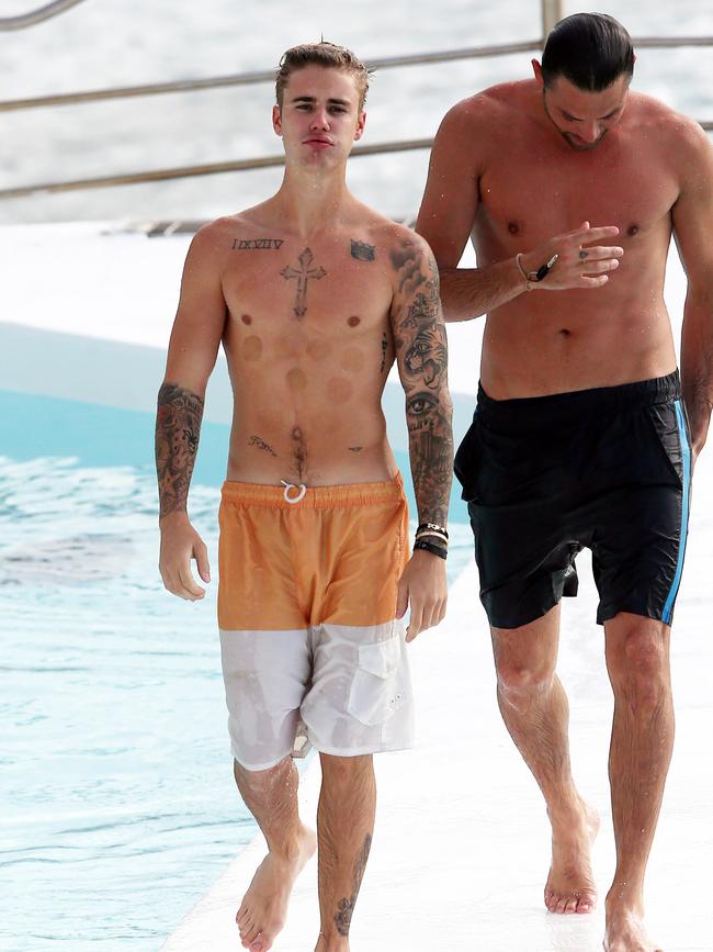 Justin Bieber spotted swimming at Bondi Iceberg in Sydney. Picture: KHAPGG/Matrix
