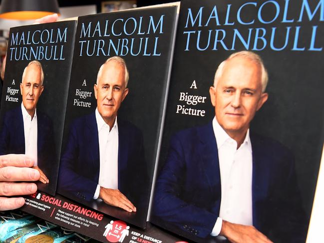 Copies of former Australian prime minister Malcolm Turnbull autobiography are placed on the shelf after it's Australian release in Melbourne on April 20, 2020. - Critical of current prime minister Scott Morrison, the memoir was released early after pirated copies found their way into the hands of politicians and media with the publisher sending a cease and desist notice to a top aide in Morrison's office alleging a massive breach of intellectual property had been committed. (Photo by William WEST / AFP)