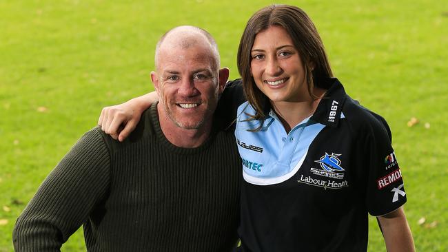Boxer and former NRL player Garth Wood with daughter Mia, 17, who is starring in both rugby league and rugby union.