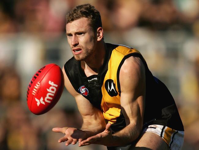 LAUNCESTON, TAS - JUNE 18:  Shane Tuck of the Tigers in action during the round 12 AFL match between the Hawthorn Hawks and the Richmond Tigers at Aurora Stadium on June 18, 2006 in Launceston, Australia.  (Photo by Ryan Pierse/Getty Images)