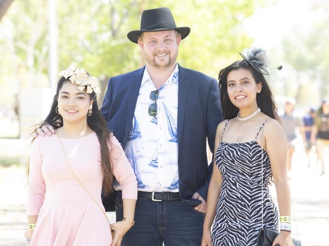 Allen Garfin, Benjamin Trattles and Muna Rokaha at the Katherine Races 2022. Picture: Floss Adams.