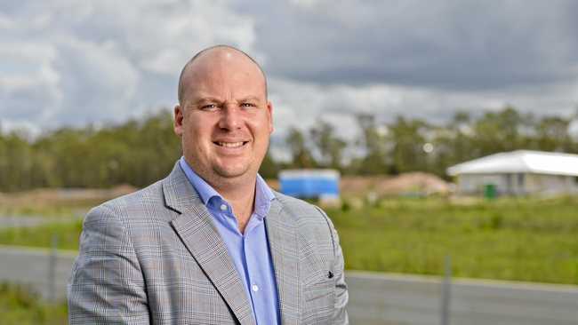 FOR SALE: Harcourts estate agent Sam Devlin at the new housing development on Henderson Street, Redbank. Picture: Cordell Richardson