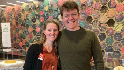 Graeme Wolgamot with wife Amy at the Museum of Australian Democracy, where she works.