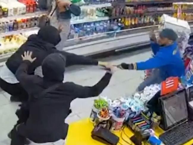 CCTV shows Melbourne convenience store worker Mohammed Panihani, 35, being attacked by teens armed with swords leaving him with lifelong injuries. Picture: 7 News