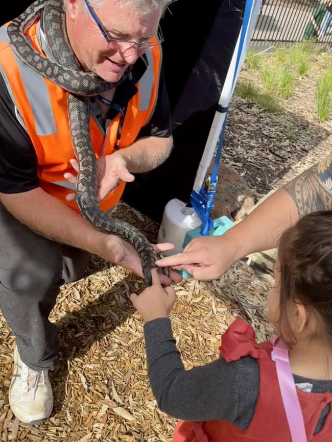 Mr O'Connor in his element teaching children about snake safety. Picture: supplied